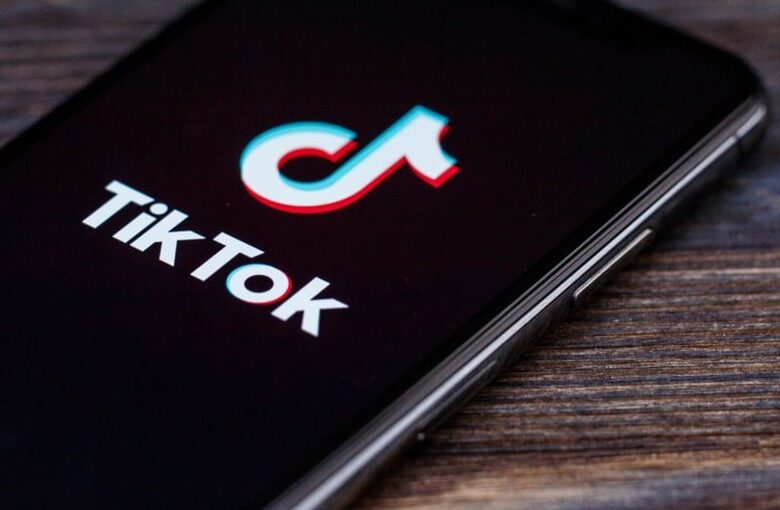 TikTok logo on a phone