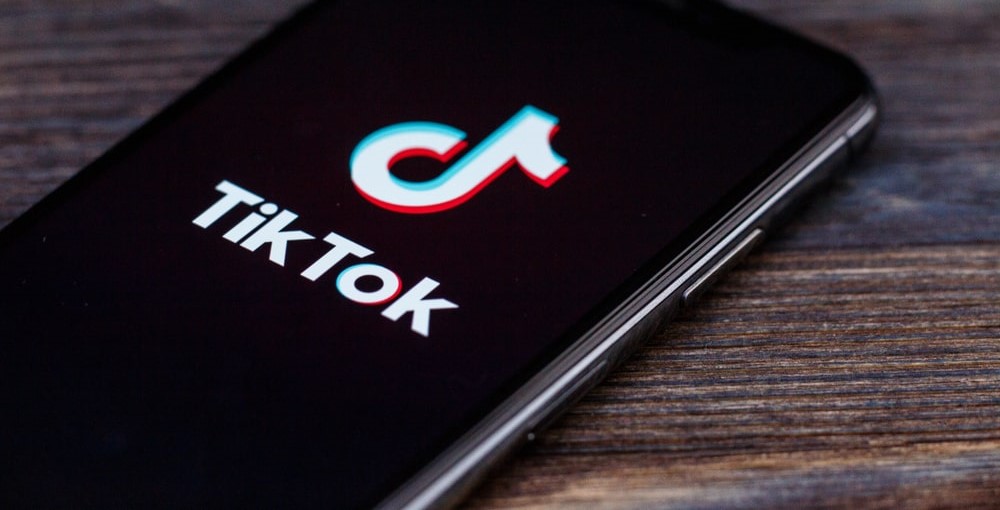 TikTok logo on a phone
