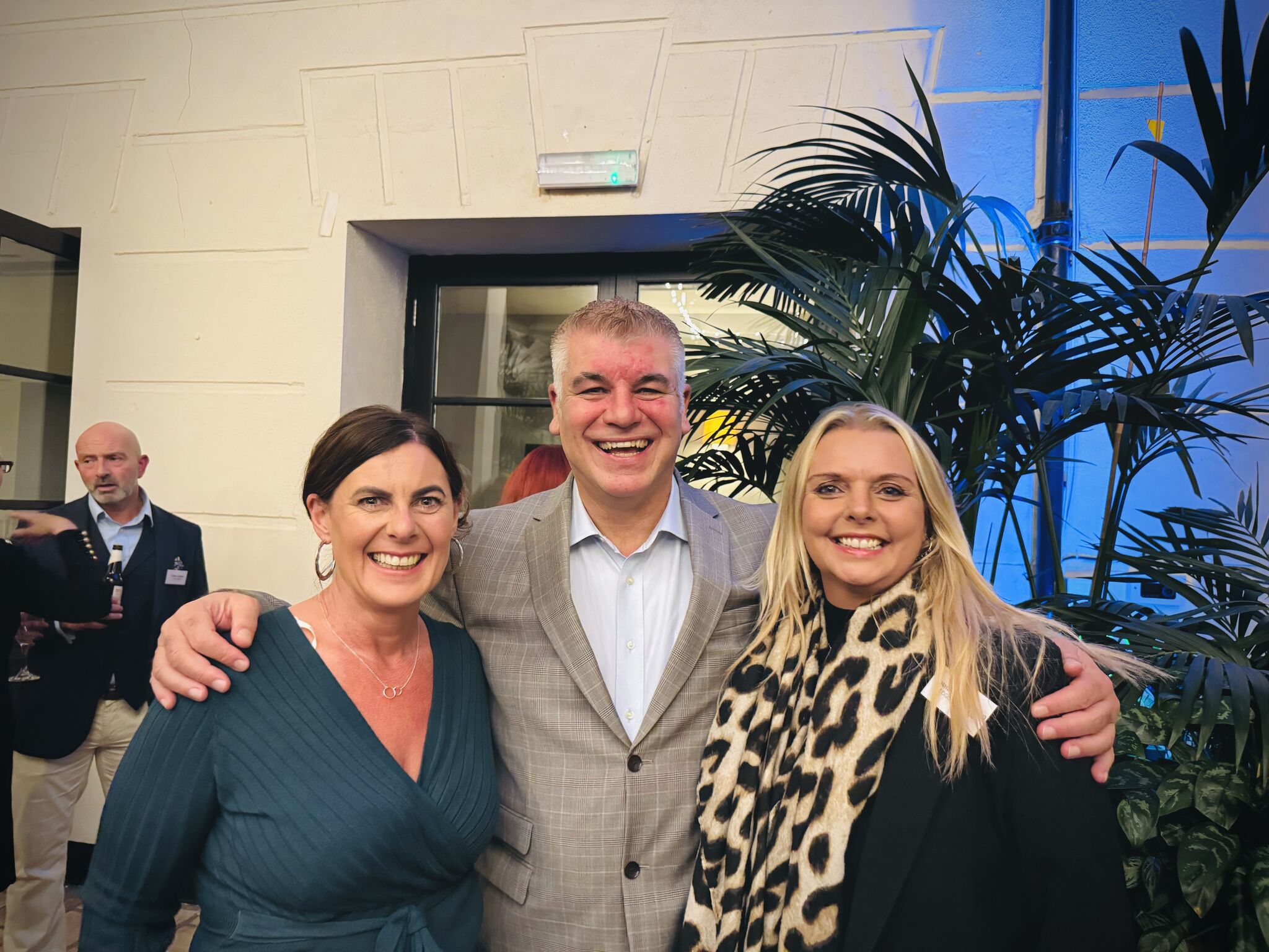 Karen, Mark, Lou posing for a photo