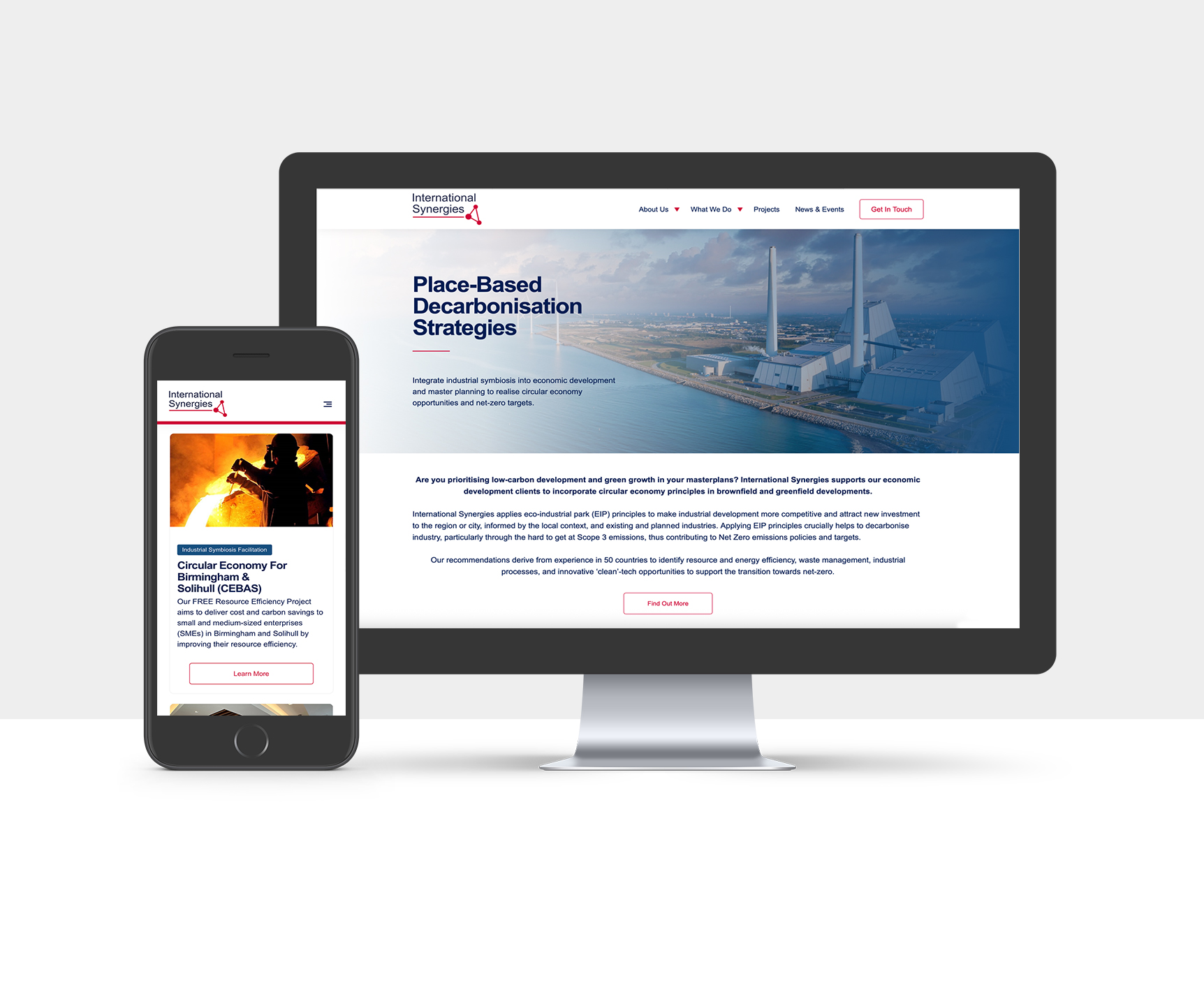 phone and desktop computer showing a website.